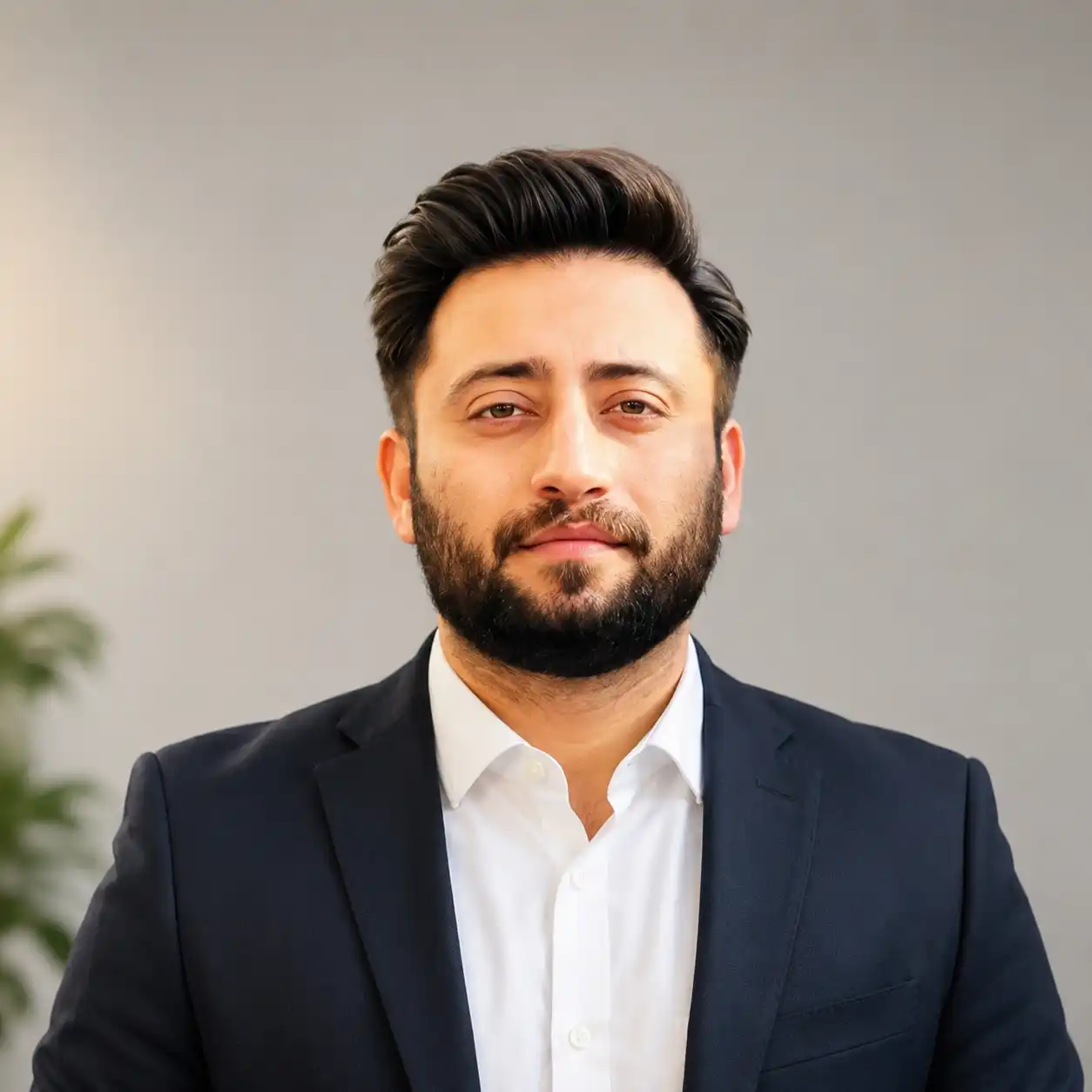 Malik Hassan, Co-Founder · Google Ads & Meta Ads Manager